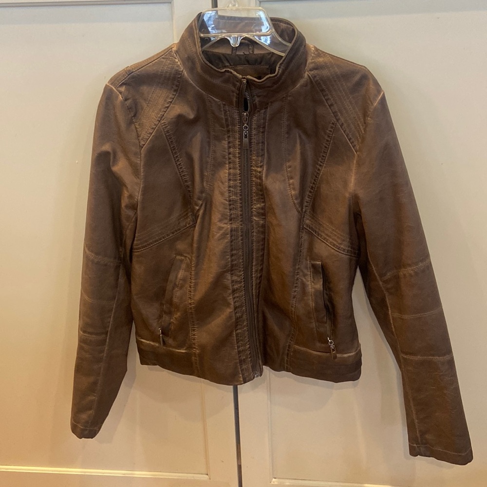 Brown kind of copper tone leather jacket lightly used